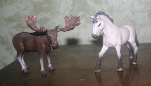 Pet pony and his friend, the moose.